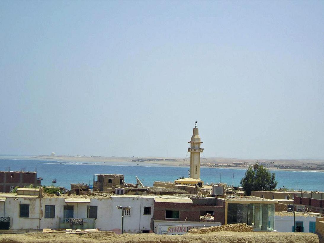 The old town of El Quseir by the Red Sea, a mosque minaret rising above flat-roofed houses